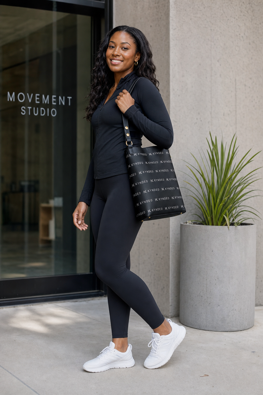 KYNDEO Noir Ivory Bucket Bag
