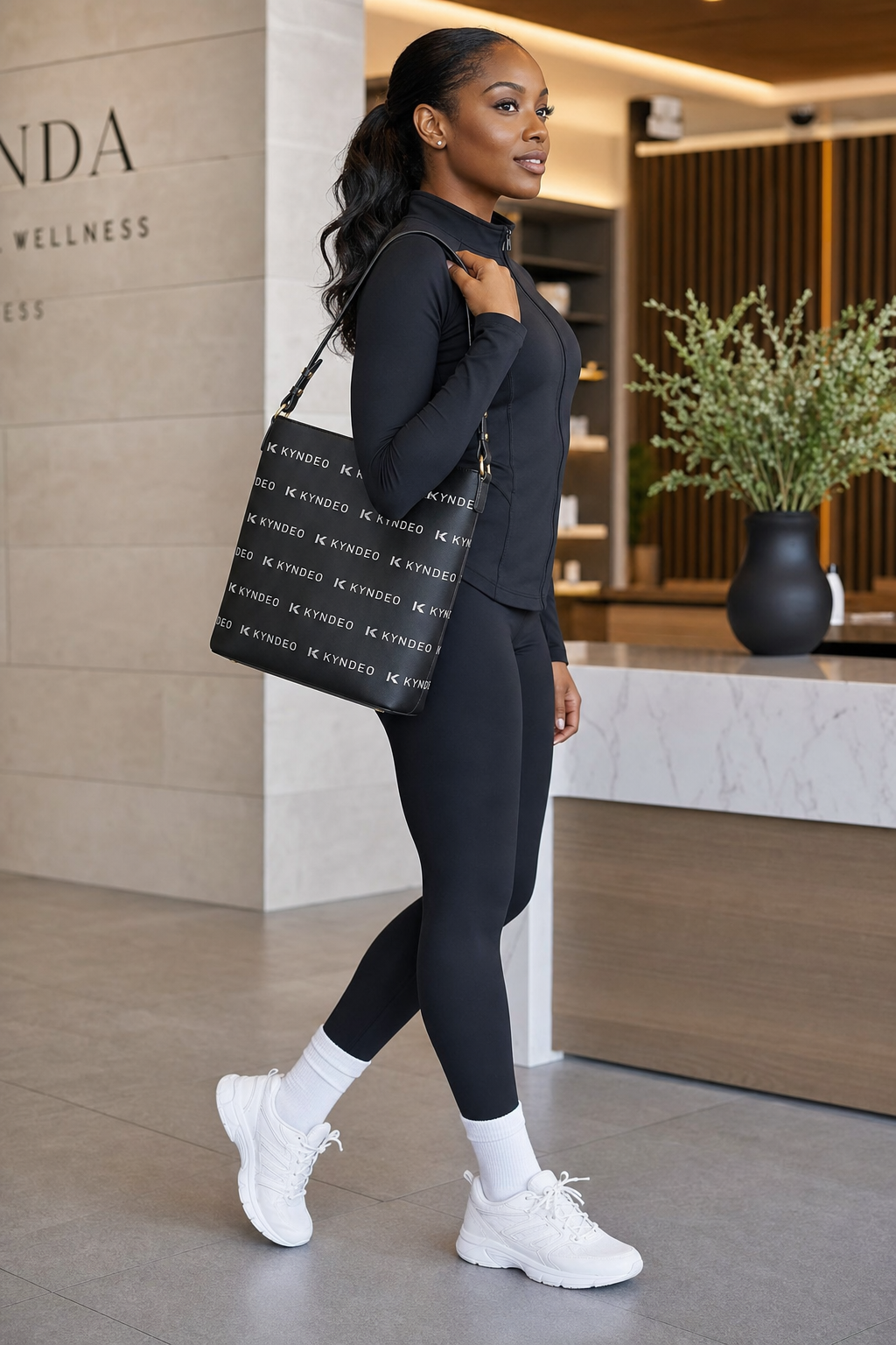 KYNDEO Noir Ivory Bucket Bag