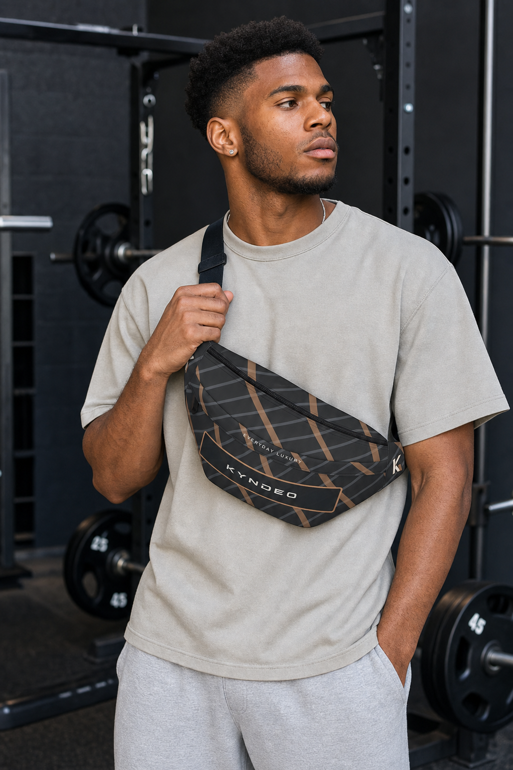 KYNDEO Motion Sling Fanny Pack - Noir Lattice worn crossbody in a gym lifestyle scene