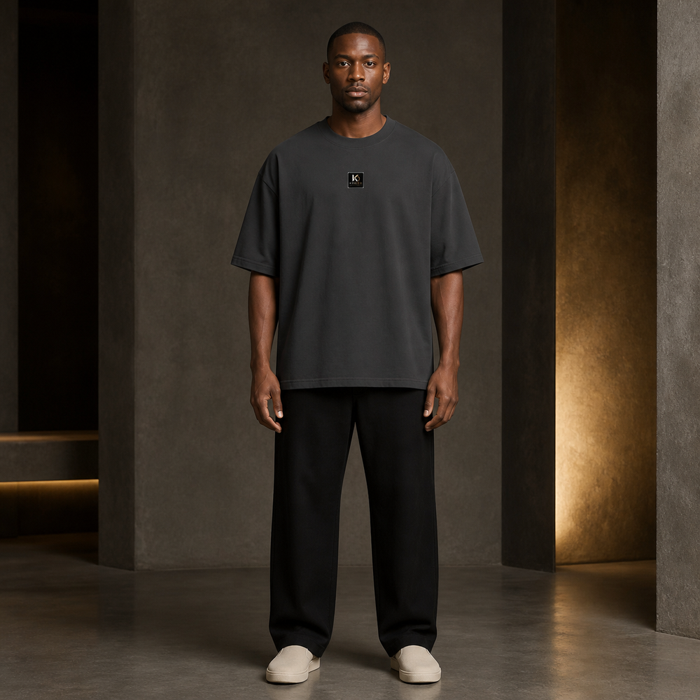KYNDEO Fadeweight Oversized Tee in faded black, complete front lifestyle view on a Black male model