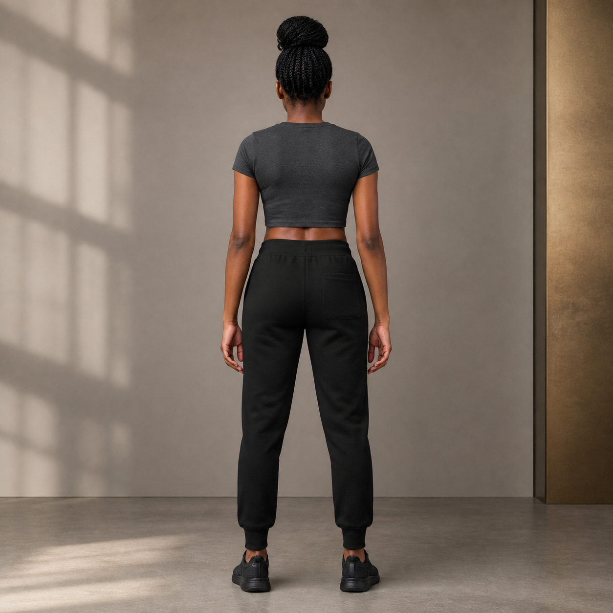 KYNDEO Hearth Fleece Sweatpant complete rear view on African American woman