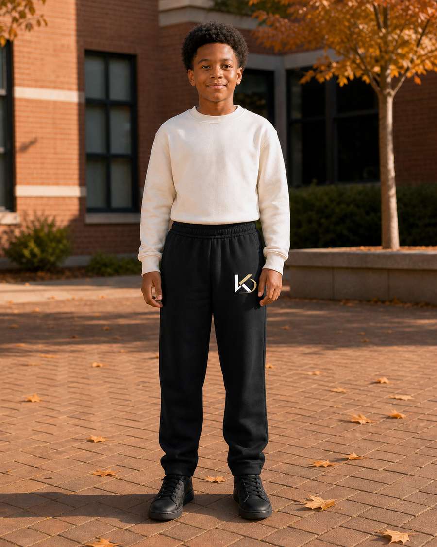 KYNDEO Youth Axis Jogger in Jet Black, complete front view from waistband to both cuffs