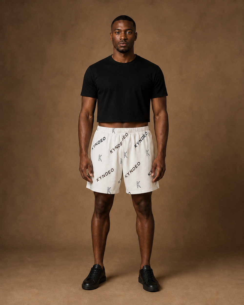Black male model wearing KYNDEO Ember Court Short, full front view
