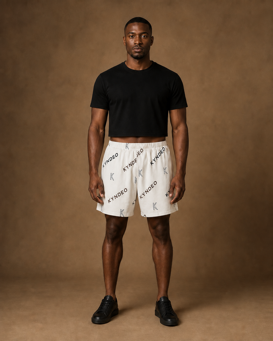 Black male model wearing KYNDEO Ember Court Short, full front view