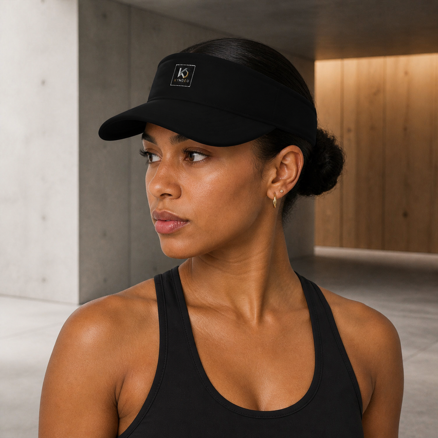 Afro-Latina woman wearing KYNDEO Shadowline Visor, left front view