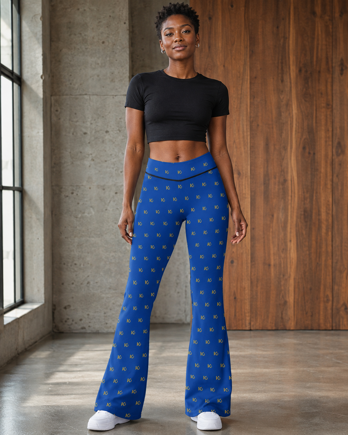 KYNDEO Contour Flare Pant — Royal Monogram — full front lifestyle view with black thread