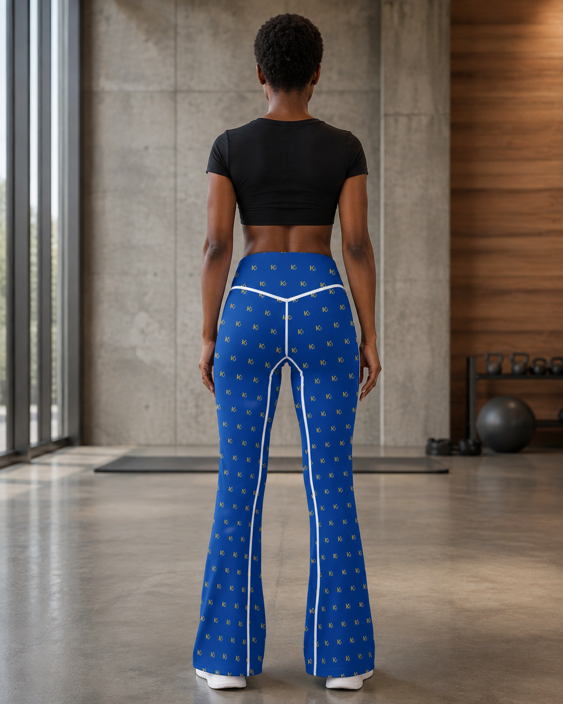 KYNDEO Contour Flare Pant — Royal Monogram — full rear lifestyle view with white thread