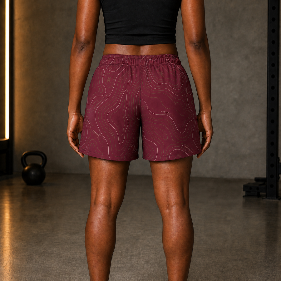 KYNDEO Oxblood Court Short complete straight rear view on Black female athlete
