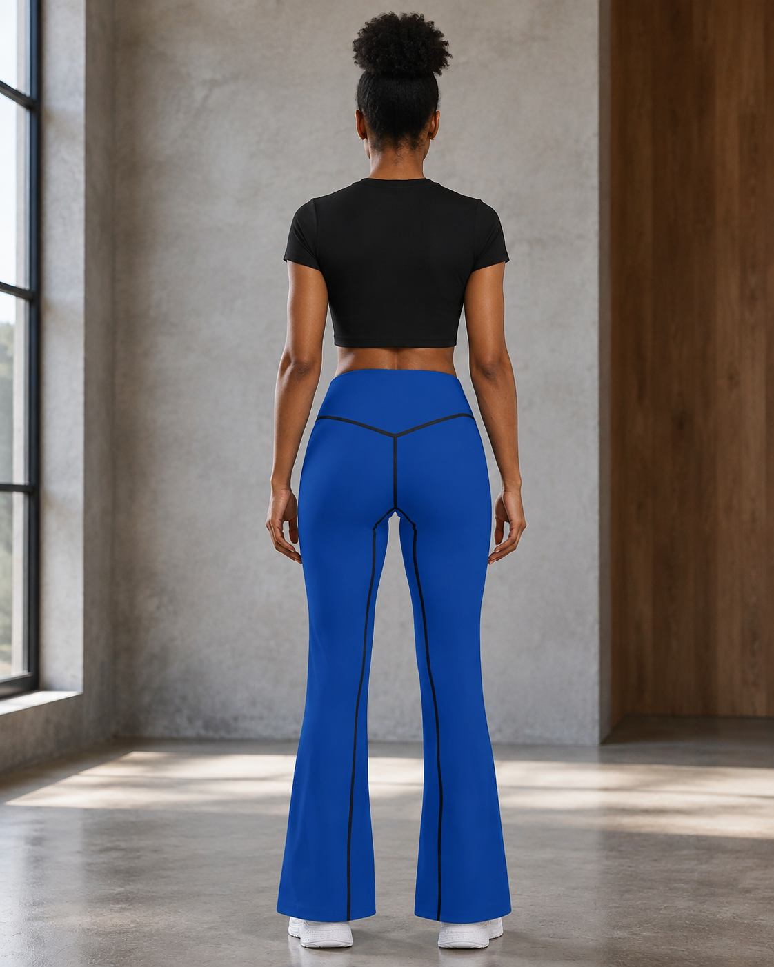 KYNDEO Contour Flare Pant — Royal Signature — full rear lifestyle view with black thread